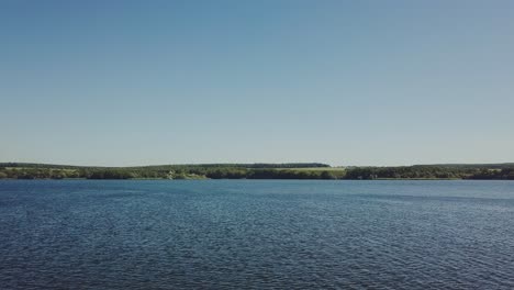 wonderful view of the wide river not far from shore in the summer