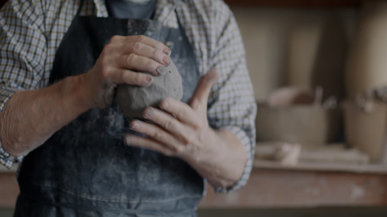 Potter Shaping Clay