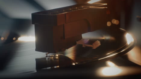 primer plano de una aguja de tocadiscos en un disco de vinilo