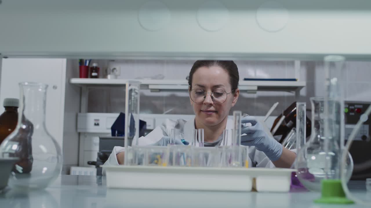 Female Chemist Doing Research in Lab