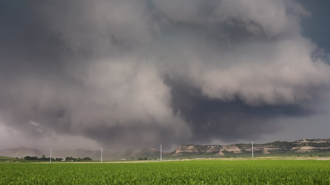 Dark Dusty Storm Cloud Drifting Over Nebraska Hills