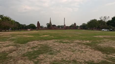 panoramic view of historic temple ruins in a field