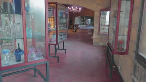 an inside view of the gordiola glassworks and museum mallorca, a large and fascinating collection of pieces tracing the manufacturing history of the glass works