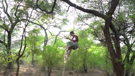 A-sporty-gymnast-performs-exercises-with-a-rope-in-Indian-traditional-wear