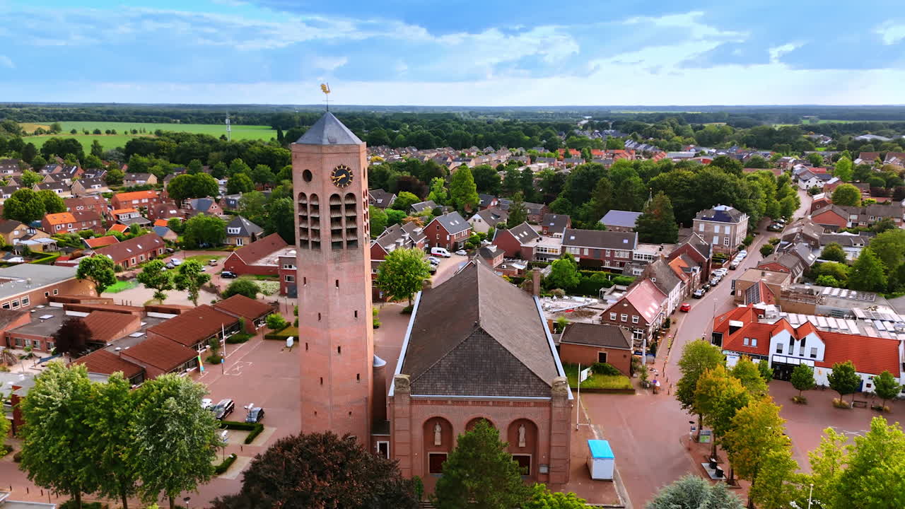 Dutch village beside open farmland. A panorama of a Dutch village blending rooftops with open agricultural fields