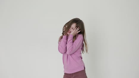 Young Girl Expressing Various Emotions (Happiness, Shyness, and Sadness)