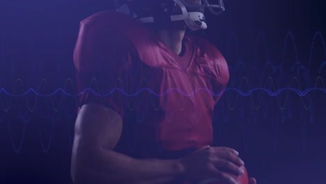 american football player in red jersey holding ball with sound wave animation