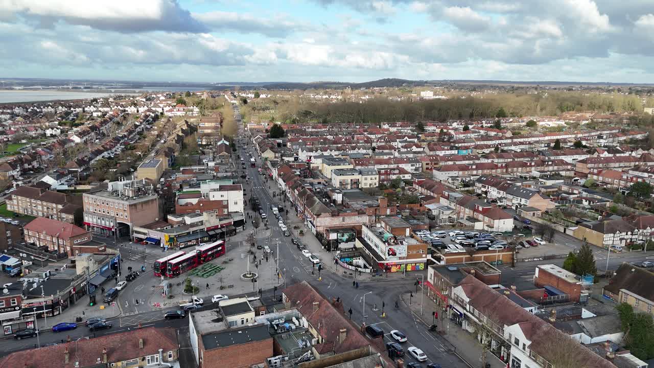 Chingford Mount shopping area UK drone,aerial City skyline in background