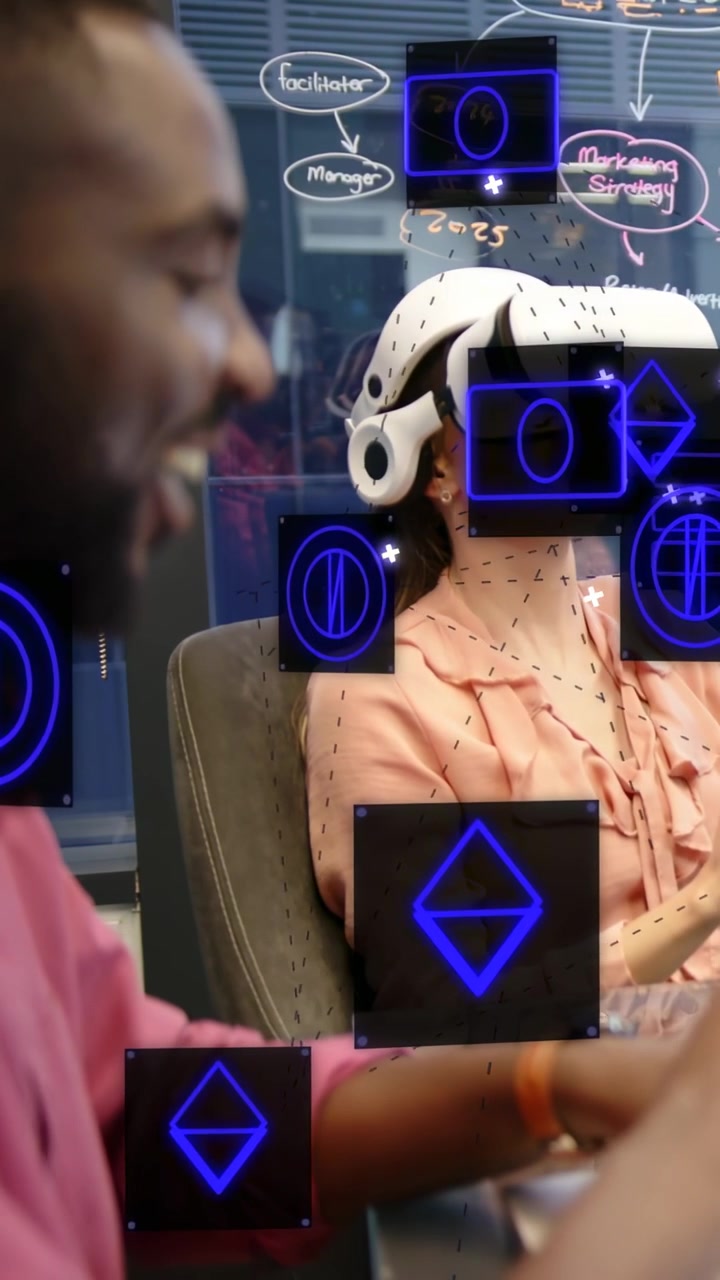 Vertical video: Man gesturing to start marketing demo while woman in headset viewing AR UI on glass