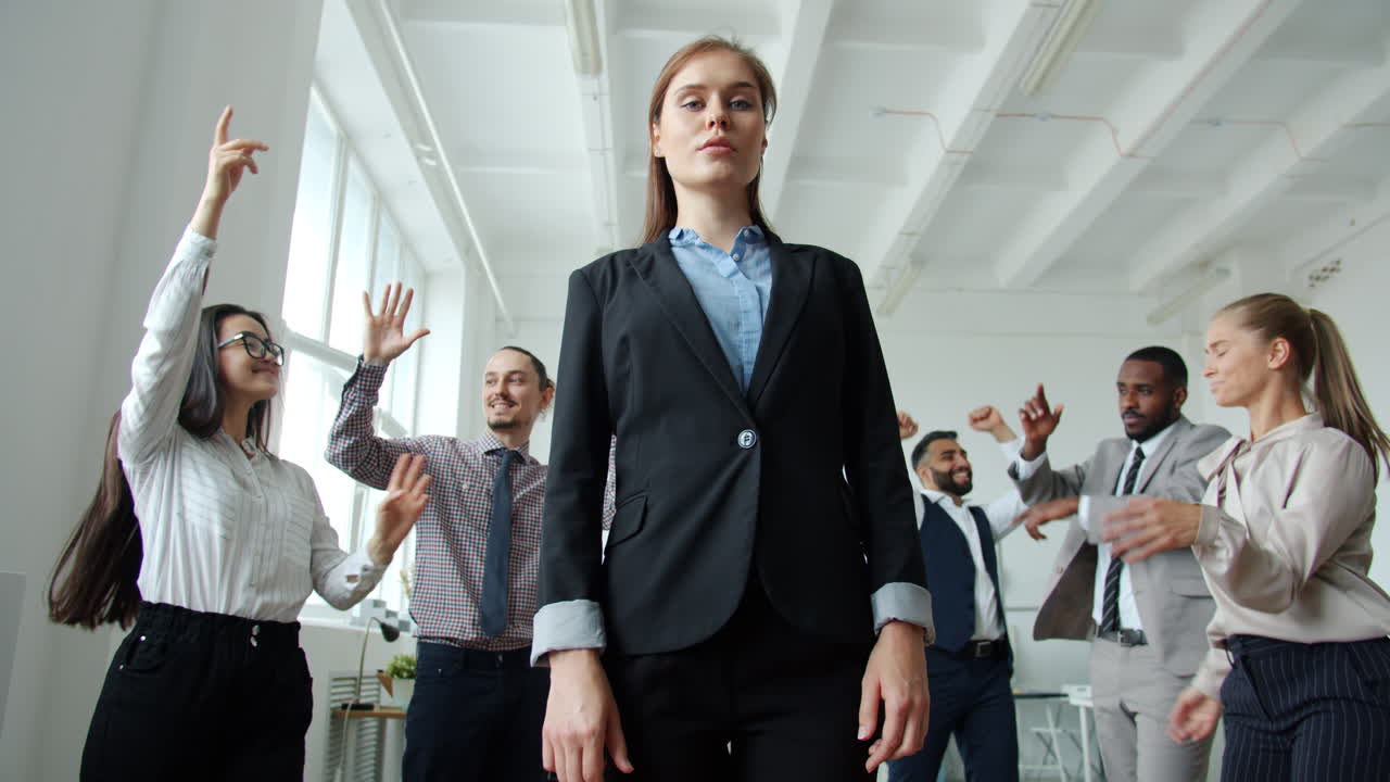 Business Team Celebrating in Office