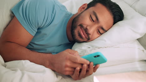 Relax,-bed-and-man-typing-with-phone