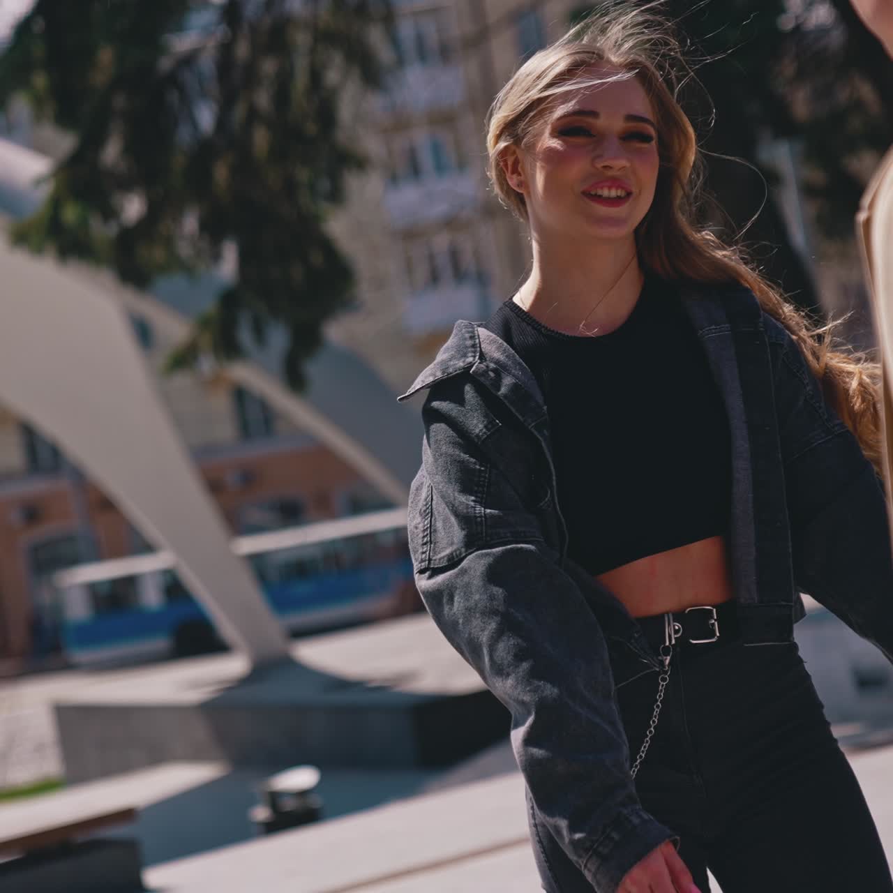 Happy couple in love holding hands of each other while spending time together in the park. Romantic date concept