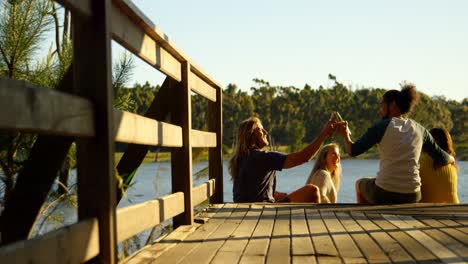 Friends-sitting-on-stair-and-having-fun-in-cabin-4k