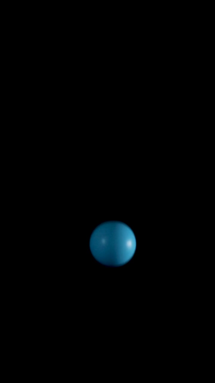 Molteplici sfere blu rimbalzano e cadono attraverso un vuoto oscuro in una composizione verticale.