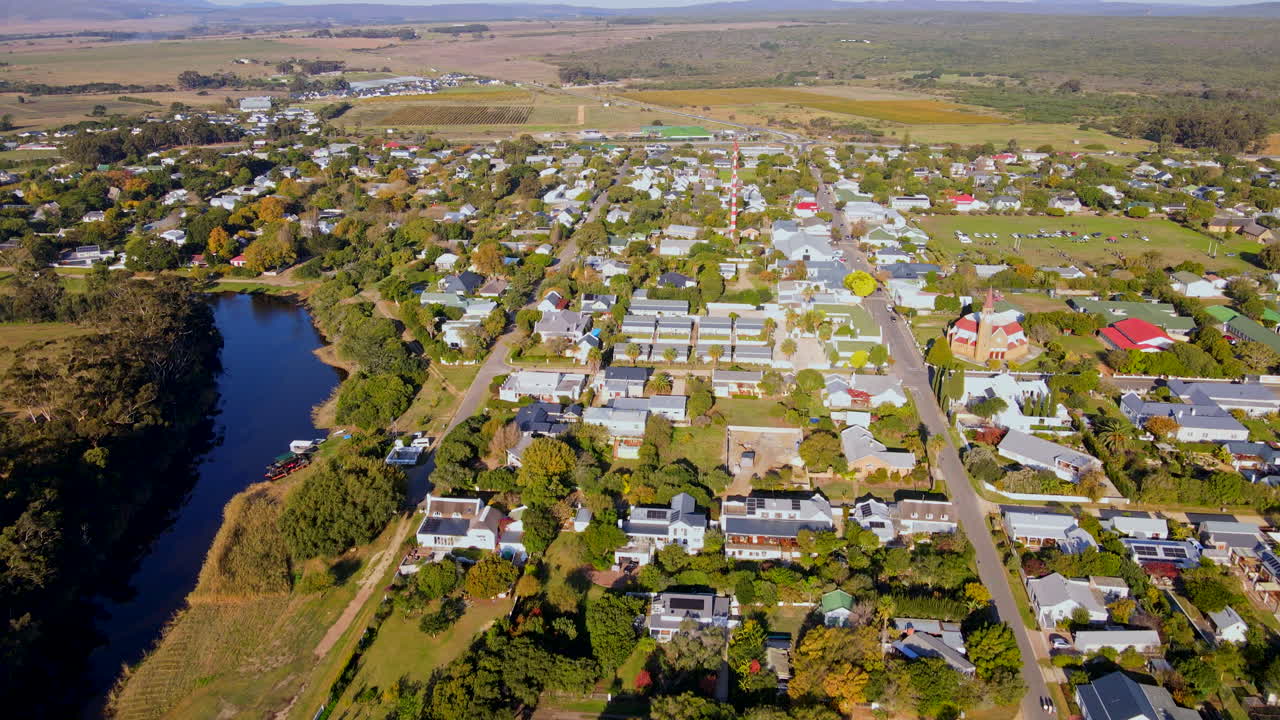 High sunset aerial view over countryside town Stanford located next to river