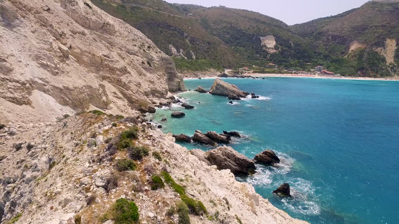 Cliffside view of Petani Beach with turquoise waters in Kefalonia, Greece
