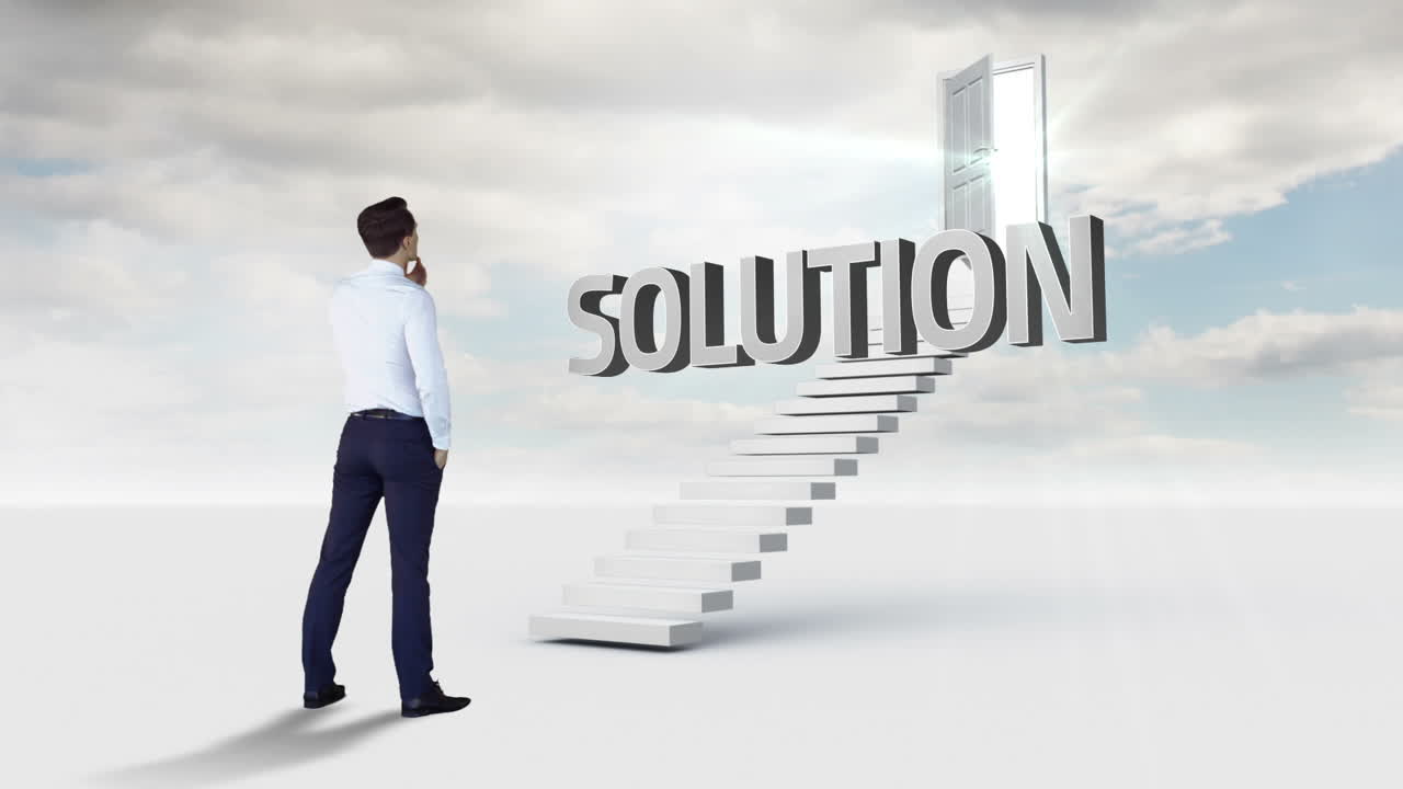 Businessman looking at a word on a stair 