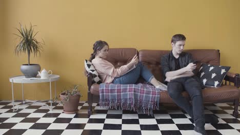 young couple relaxing on a sofa