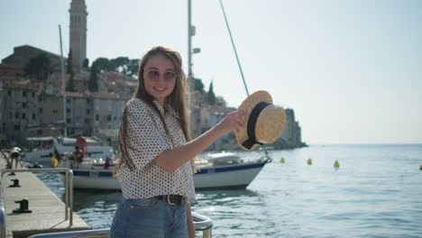 young woman enjoying a day at the croatian coastal city