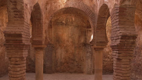 POV-walking-4k-Ronda-Arabic-baths-old-historical-ruins-of-Arabic-culture-in-Spain,-shot-on-stabilizing-gimbal-with-full-frame-camera