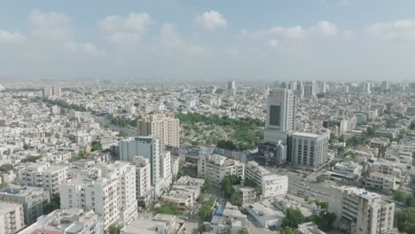 Aerial-View-Of-Shahra-e-Qaideen-Road-In-Up-Market-Karachi-On-Sunny-Day