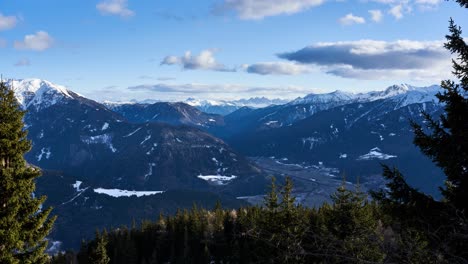 Stunning Winter Panorama of Snowy Mountains and a Serene Valley