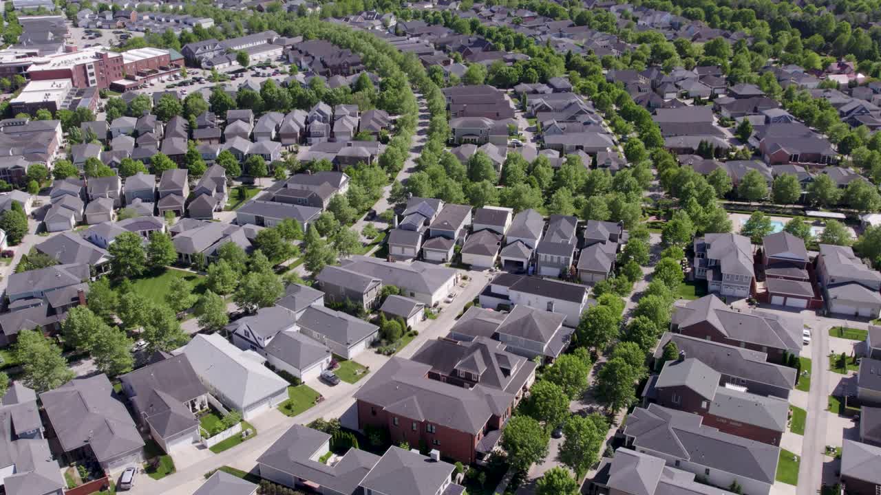 Drone shot of homes and streets in the Norton Commons neighborhood of Louisville, KY. Ideal for real estate, community planning, and suburban lifestyle content.