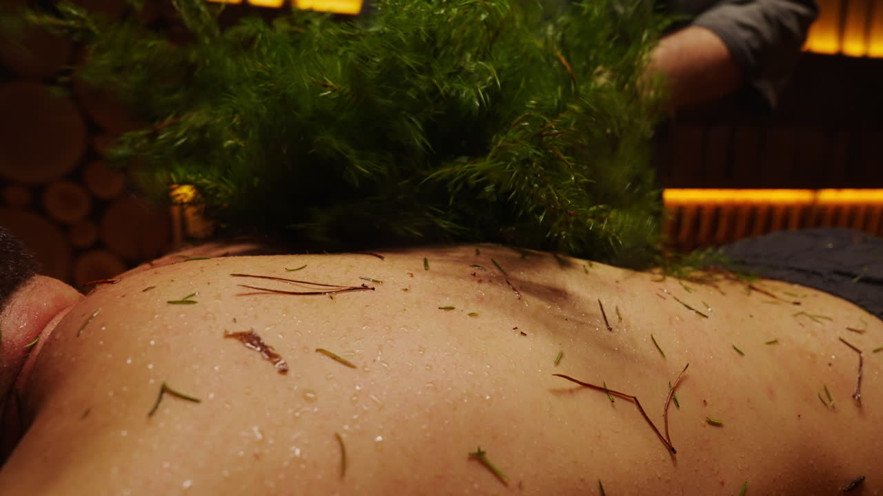 Herbal Back Treatment in a Sauna
