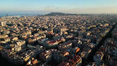 aerial view of typical buildings of barcelona cityscape. eixample residential famous urban grid. (catalonia, spain)