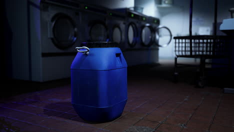 blue plastic container in a dark laundry room