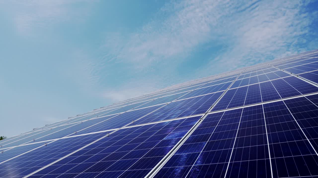 Blue photovoltaic solar panels, blue sky. The concept of clean energy, green energy, renewable energy. Alternative energy concept. Photovoltaic panel