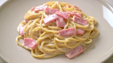 homemade spaghetti white cream sauce with ham - italian food style