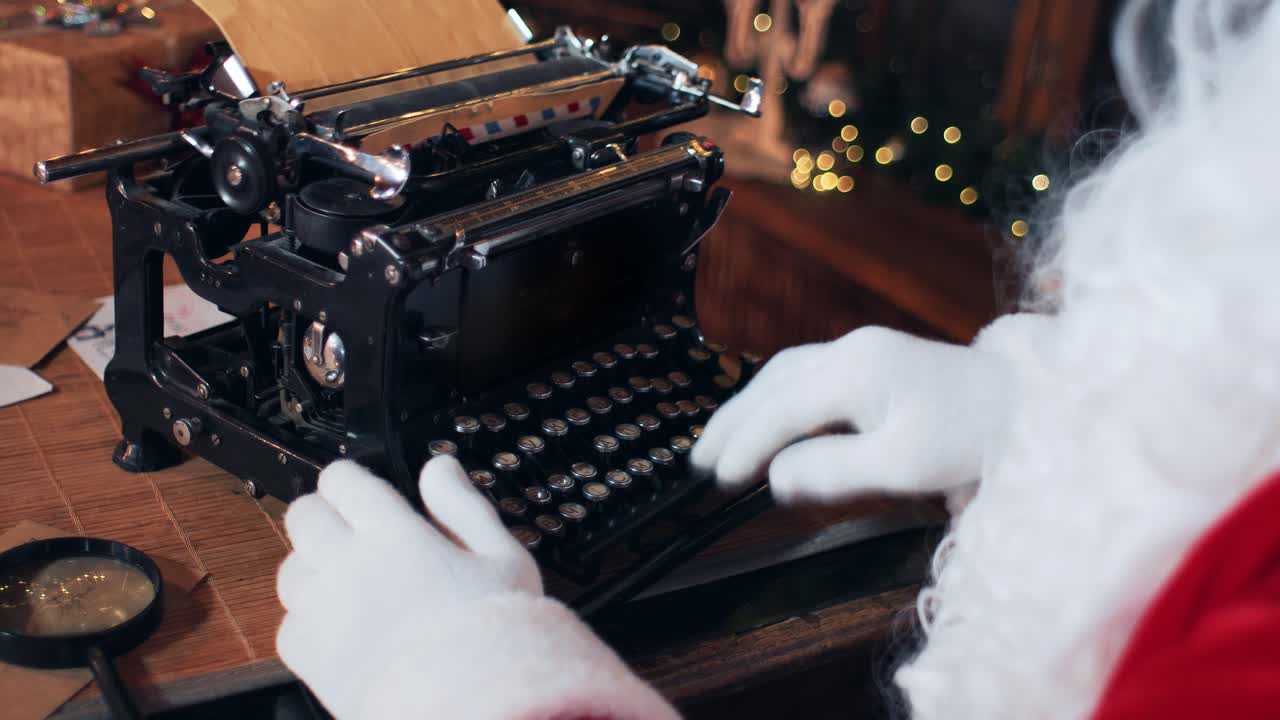 Santa Claus writing reply to a letter on a typewriter