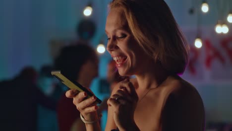 woman talking on phone at a party