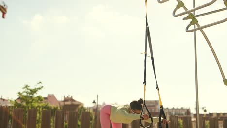 woman exercising with resistance bands outdoor