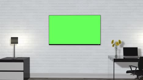 a room inside the building with furniture and a green screen tv on the wall.