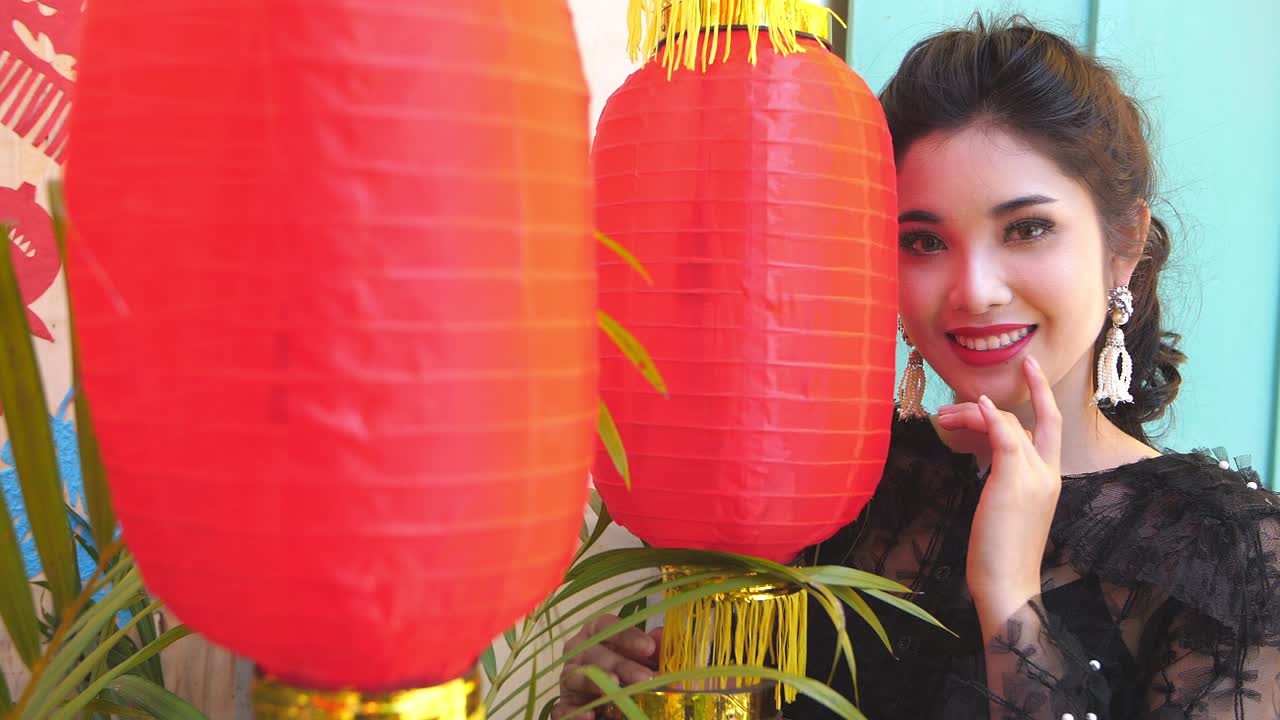 Asian Woman Posing with Red Lanterns