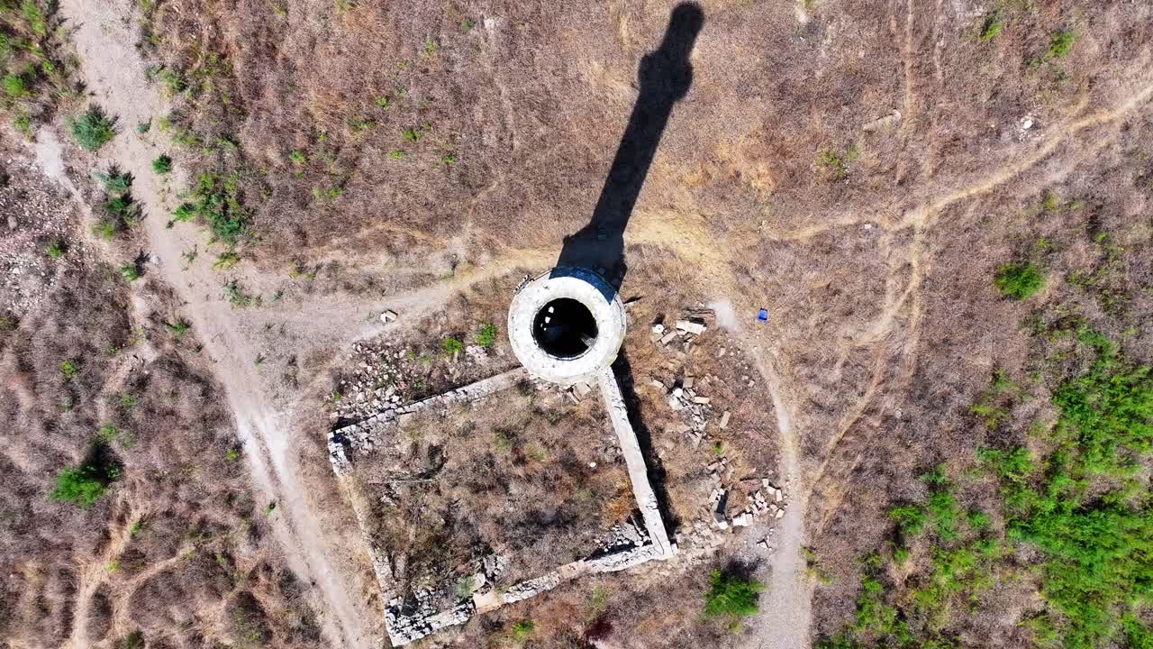 Drone shot of the abandoned mosque minaret in the dried-up lake