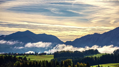 Thin-Clouds-Floating-Over-Countryside-With-Dramatic-Sunrise-Sky