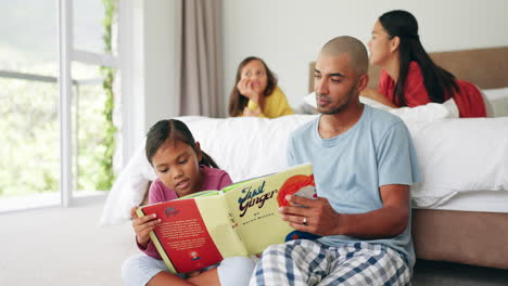 father reading books to child in bedroom