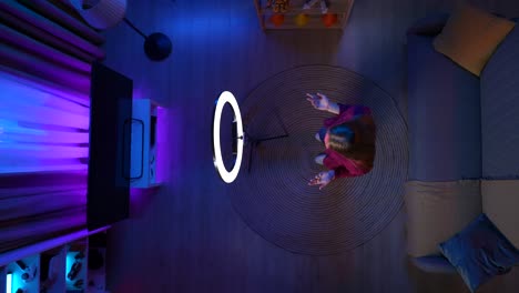 woman filming a video in a home studio