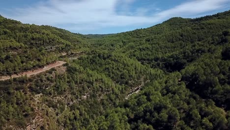 Aerial-view-of-Catalonian-mountains,-in-Parc-Naturel-de-Sant-Llorenc-del-Munt-i-L'Obac,-Spain,-Europe