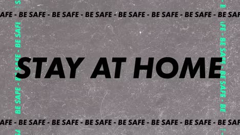 Words-Be-Safe,-Stay-At-Home-written-in-black-and-green-letters-on-grey-background.-