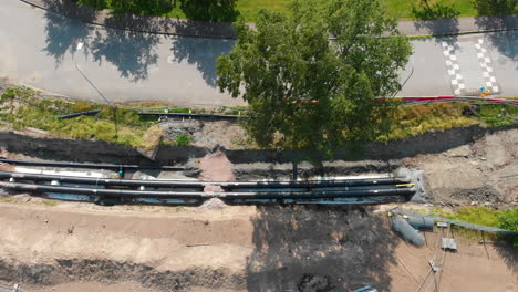 heating pipelines in the trench, aerial top down shot