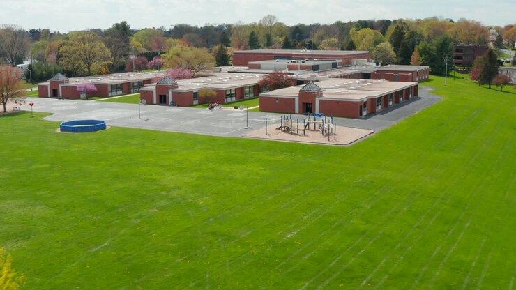 Establishing aerial of school building playground for recess