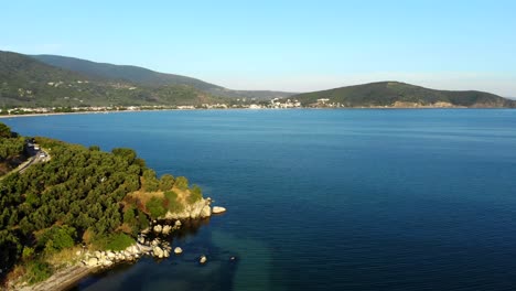 Aerial:-captivating-flight-between-beach-and-sea-over-Marmara-Sea,-Balikesir,-Turkey