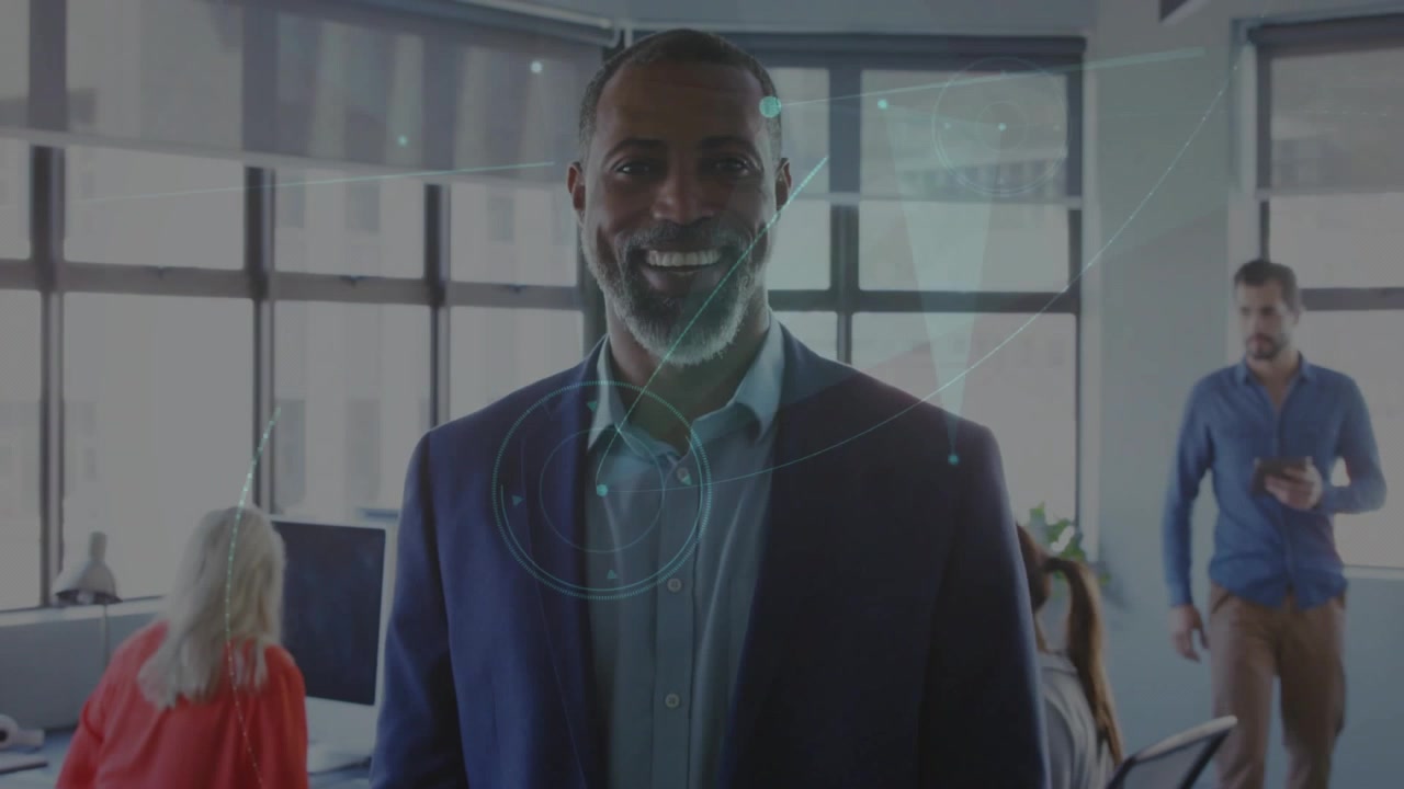 Executive guiding technology hub, network lines emerging linking workstations for collaboration
