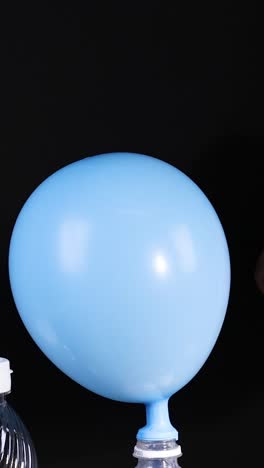 balloon inflates using chemical reaction in bottle