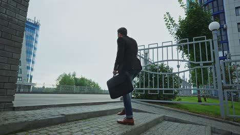 businessman walking up stairs