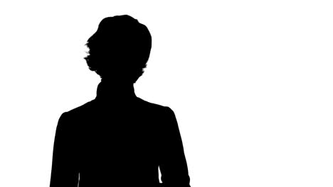 silhouette businesswoman talking to camera track matte